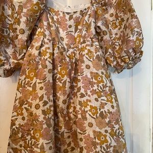 Storia babydoll dress size small. Brand new with tags. It is a beautiful dress.